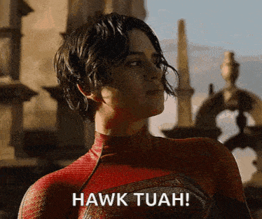 a woman in a spiderman costume says " hawk tuah "