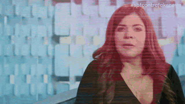 a woman 's face is shown in a blurry photo with the hashtag #sbtcontrajokenews