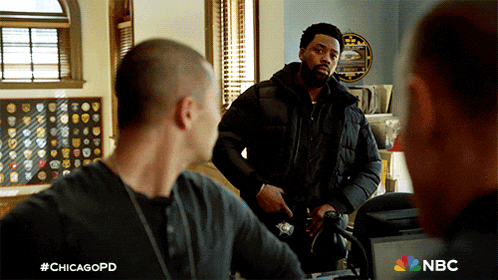 a nbc advertisement for chicagopd shows two men talking