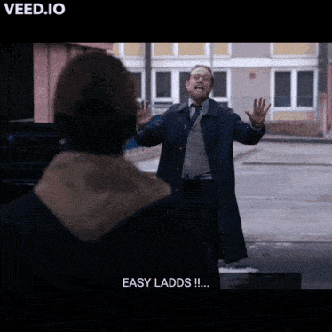 a man in a trench coat says " easy ladds "
