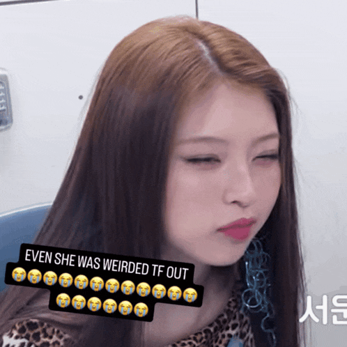 a woman with a sticker on her face that says even she was weirded tf out