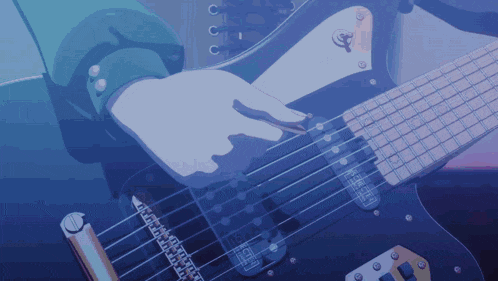 a person is playing an electric guitar with a jaguar logo on the headstock