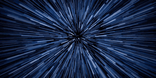 a blue background with a burst of light in the center
