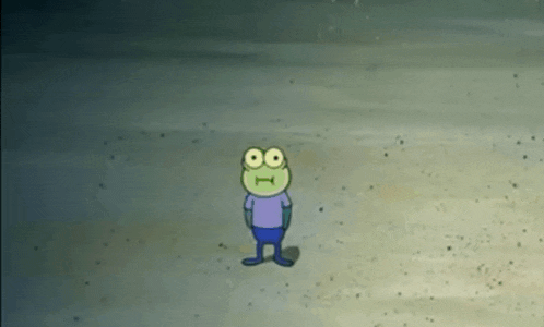 a frog from spongebob squarepants is standing in the sand