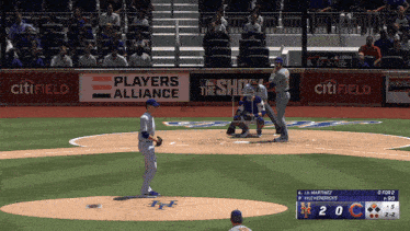 a baseball game is being played in front of a citifield banner