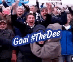 a group of people are holding up signs that say goal #thedee