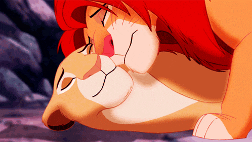 a cartoon of a lion and a lioness with their eyes closed