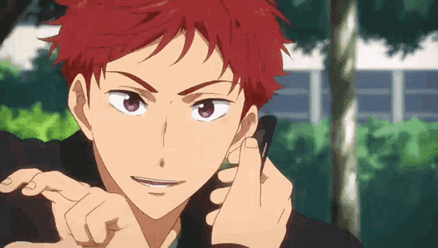 a close up of a person 's face with red hair