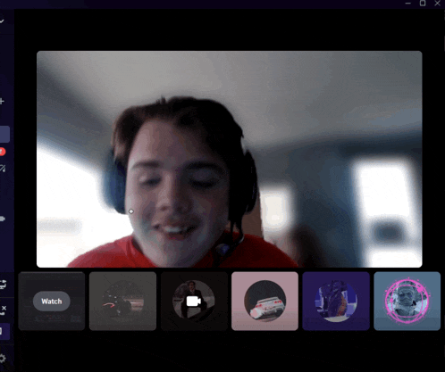 a boy wearing headphones is on a video call and the watch button is visible