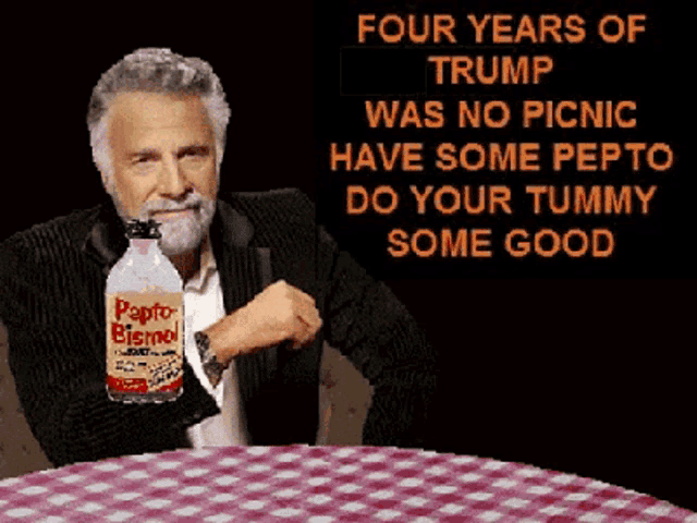 a man sitting at a table with a bottle of papto bismol in his hand