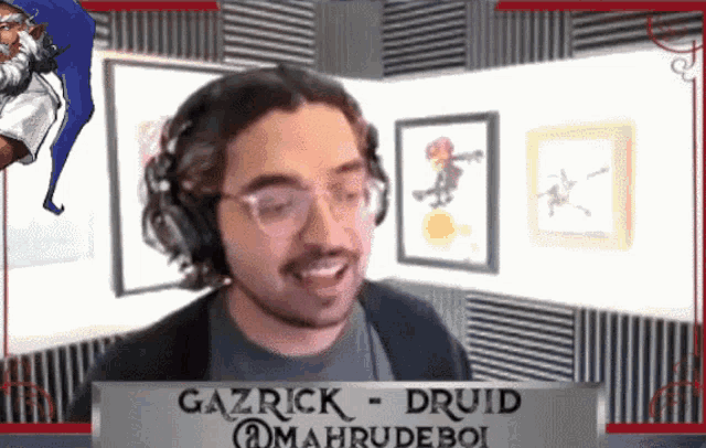 gazrick druid is smiling in front of a sign
