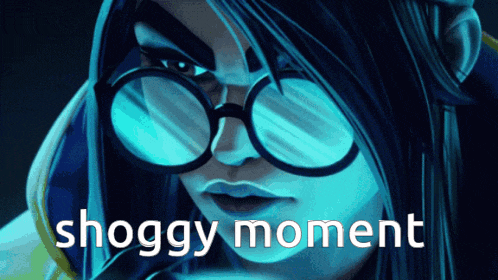 a woman wearing glasses and the words shoggy moment