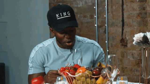 a man wearing a hat that says king on it