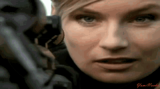 a close up of a woman 's face with a watermark that says yamile