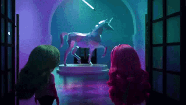 two dolls are looking at a unicorn statue in a hallway .