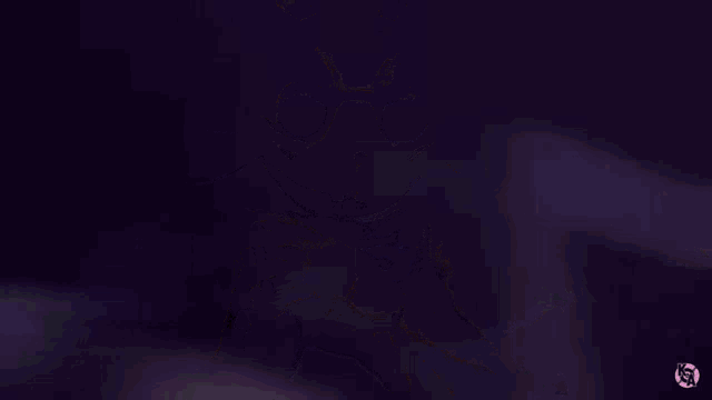 a cartoon rabbit with purple eyes and a purple bow tie is standing in a dark room .