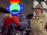 a man with a monkey face on his face stands next to another man wearing sunglasses