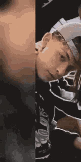 a close up of a person 's face and a close up of a person 's head .