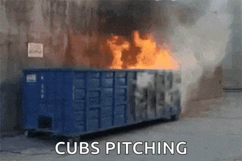 a dumpster that is on fire with the words cubs pitching written below it