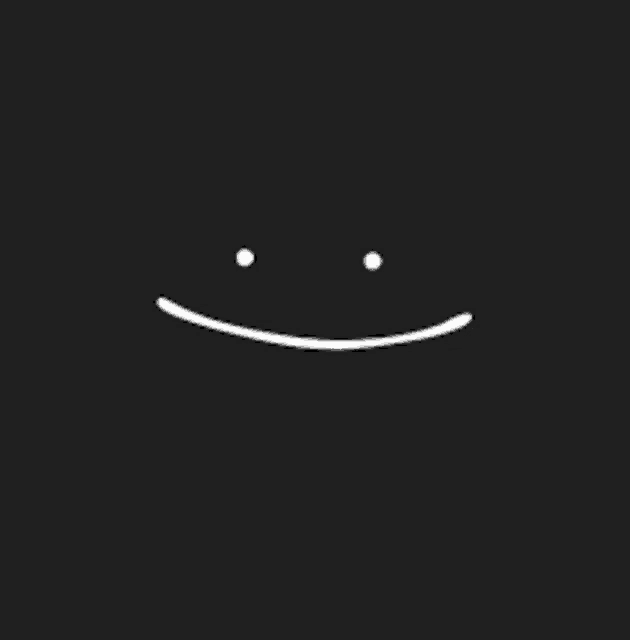 it looks like a smiley face with a slight smile on it .