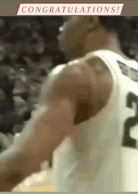 a basketball player wearing a number 2 jersey