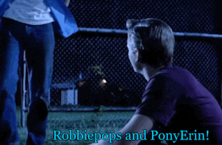 two men are sitting in front of a chain link fence with the words robbiepops and ponyerin