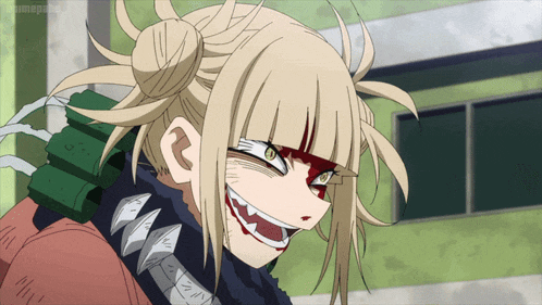a close up of a cartoon character with a huge smile on her face and the letters nm on her neck