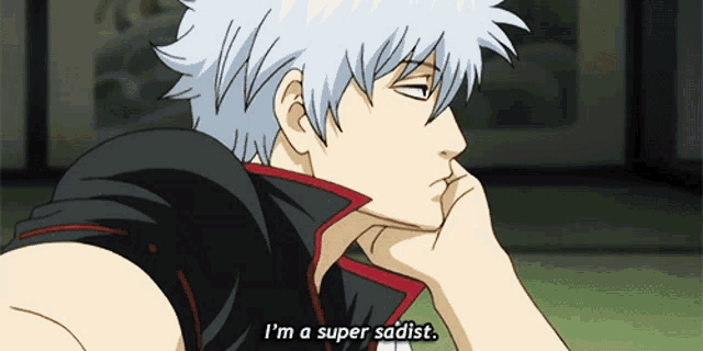 a man in a black and red vest says i 'm a super sadist