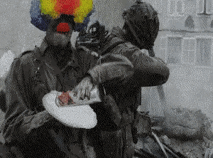 a man in a clown costume is holding a plate with food on it