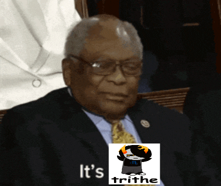 a man in a suit and tie with a picture of a troll and the words it 's trithe