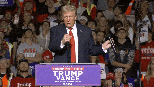 donald trump is giving a speech at a trump vance rally