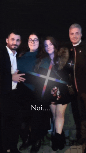 a group of people are posing for a picture with the words noi written below them