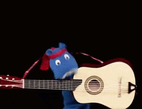a guitar is being held by a blue and red sock