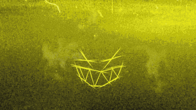 a yellow drawing of a face with sharp teeth