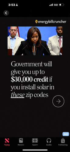 a phone screen shows an ad for energy billcruncher