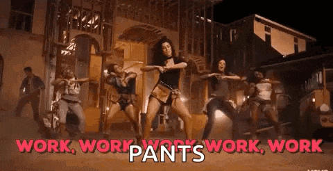 a group of people are dancing in front of a building with the words `` work , work , work , work pants '' .