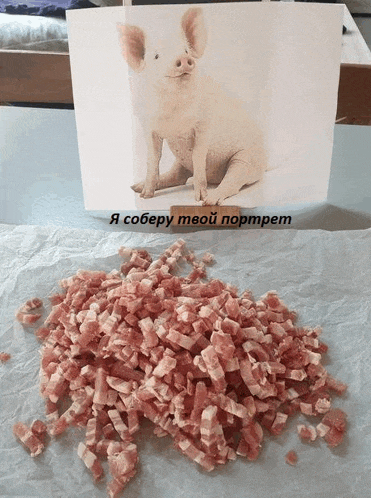 a pile of chopped bacon next to a picture of a pig with russian writing