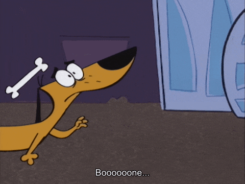a cartoon dog is laying on the floor with a bone in his mouth