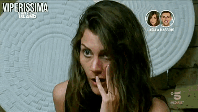 a woman with a surprised look on her face is on a tv screen with the words viperissima