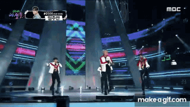 a group of people are dancing on a stage with the words make a gif.com in the lower right corner