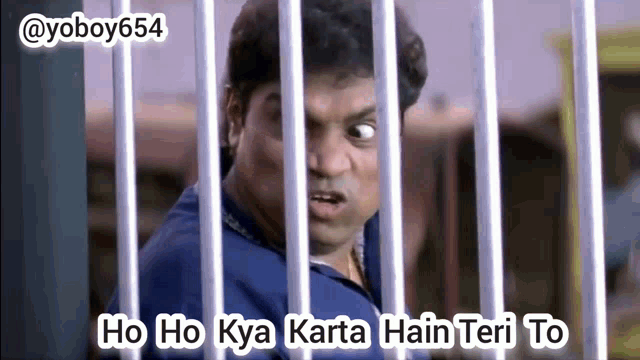 a man is behind bars with the words ho ho kya karta hain teri to on the bottom