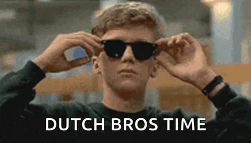 a man is wearing sunglasses and the words dutch bros time are written on the background .