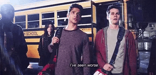 a group of people are standing in front of a school bus and one of them is saying `` i 've seen worse '' .