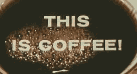 a close up of a cup of coffee with the words this is coffee written on it