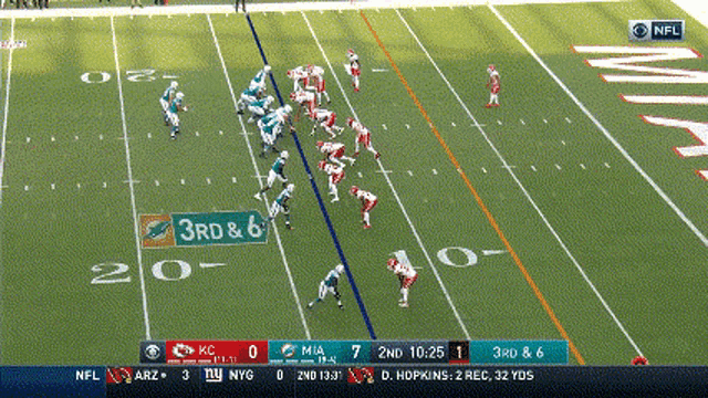 a football game is being played and the score is 3rd & 6