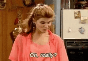 a woman in a red shirt is asking " oh really "