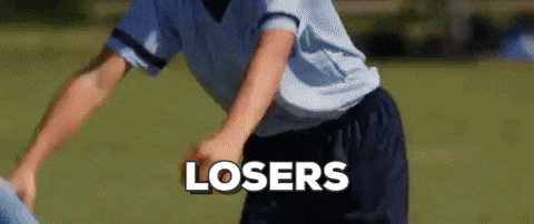 a soccer player with the word losers written on the bottom of his shorts