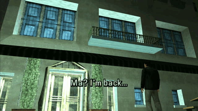a man standing in front of a building with ma i 'm back written on the screen