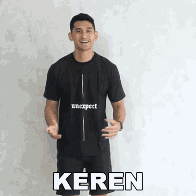 a man wearing a black t-shirt that says unexpected keren