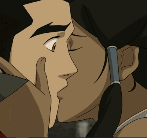 a man and woman are kissing in a cartoon
